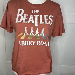 Coral color T-shirt in the size medium from the brand The Beatles